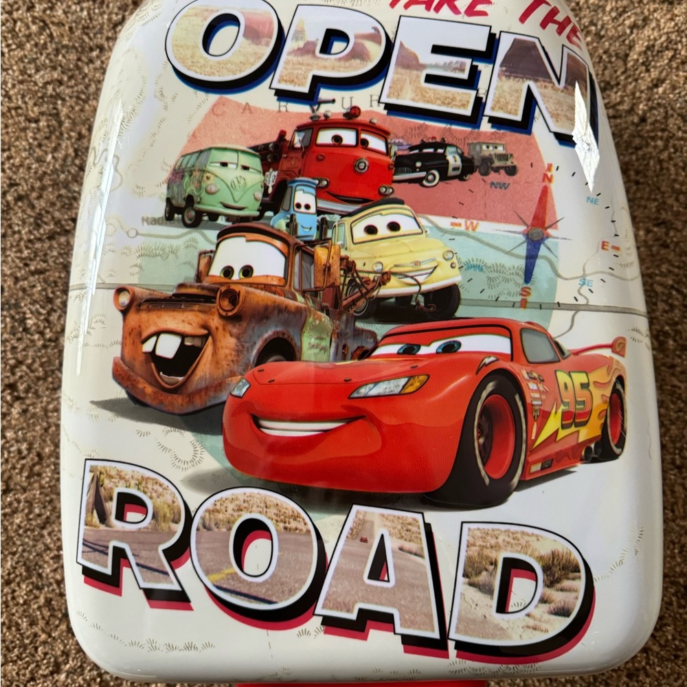 Child’s Disney Lightning McQueen roller carry on suitcase.